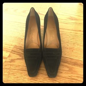 Black suede Ferragamo pumps with strap detail